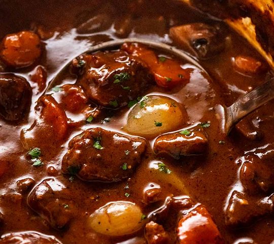 Beef Bourguignon in a pot, ready to be served