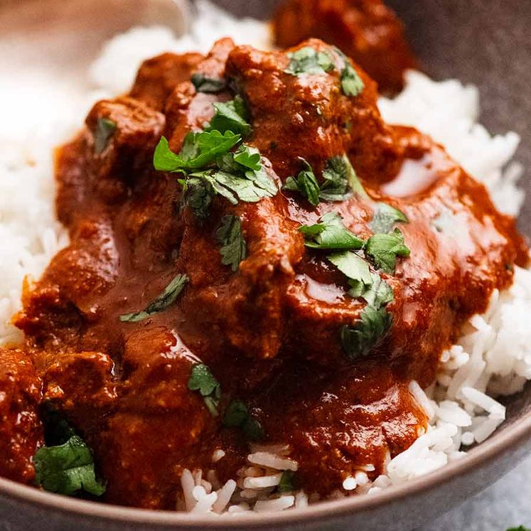 Vindaloo served over white rice