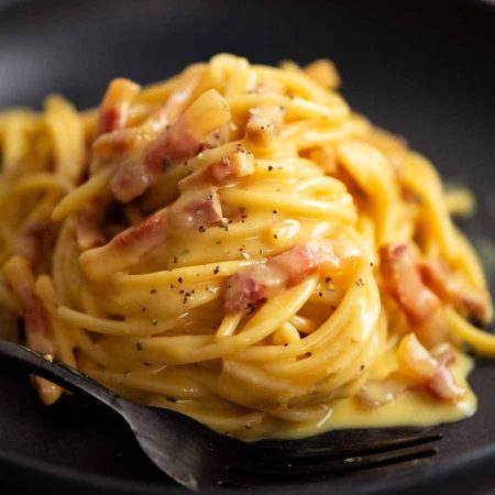 Close up of a bowl of Carbonara ready to be eaten