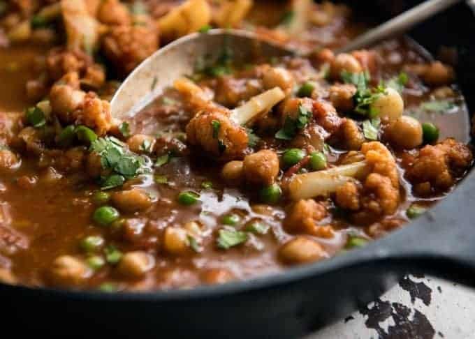 This Cauliflower and Chickpea Curry is an authentic Indian homestyle recipe that's healthy and made with everyday ingredients! www.recipetineats.com