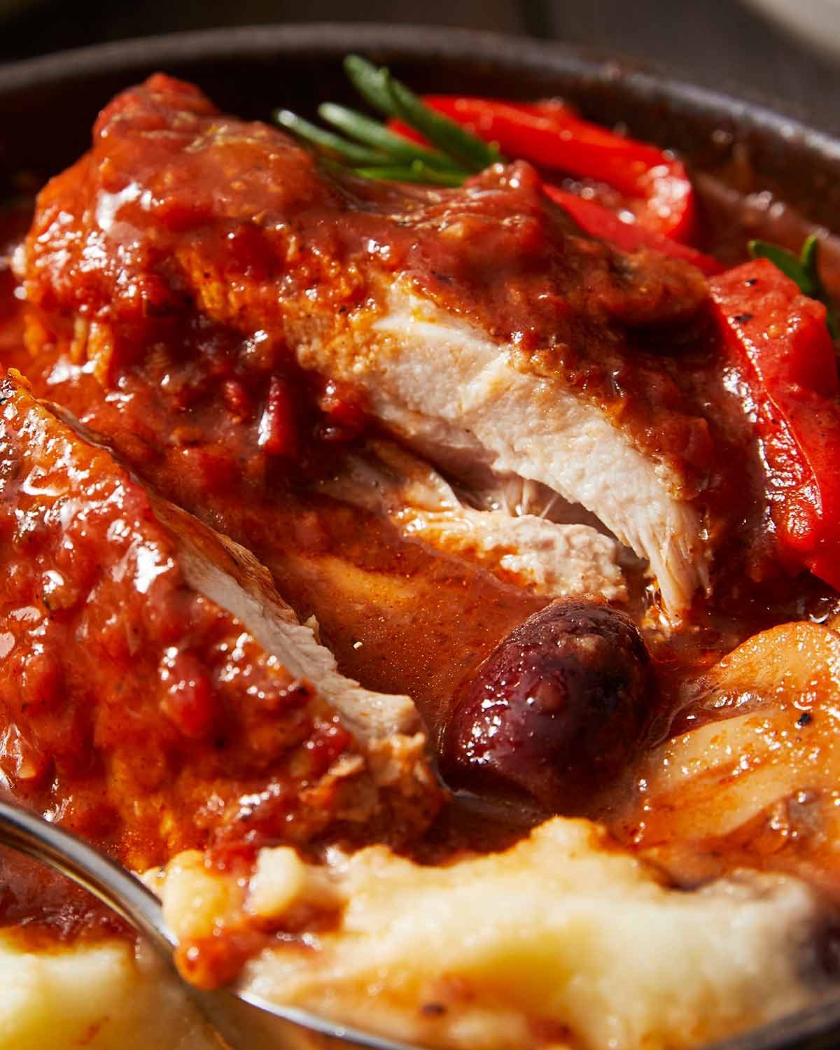 Cut open piece of Chicken Cacciatore - Pollo Cacciatore