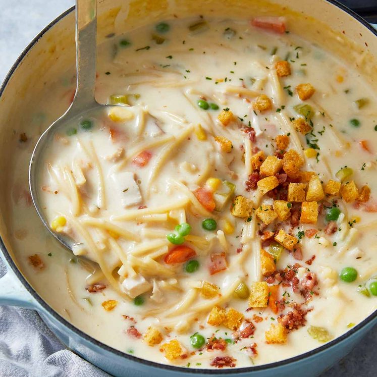 Pot of Creamy chicken noodle soup