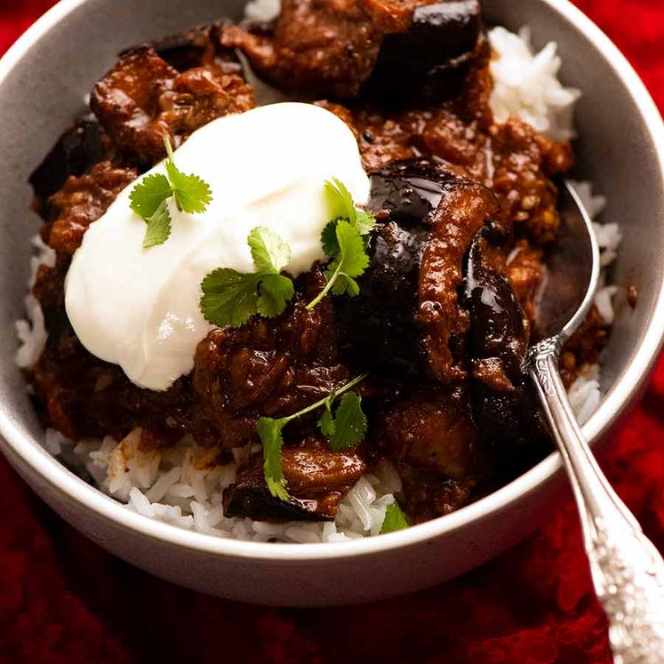 Bowl of Indian eggplant curry on rice