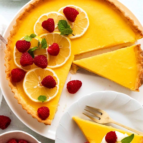 French Lemon Tart - Tarte au citron - being sliced to serve