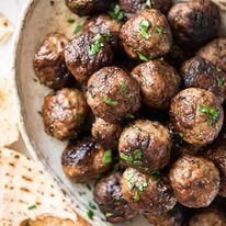 Soft, juicy, beautifully flavoured GREEK MEATBALLS! Serve as an appetiser with tzatziki, main with Greek Salad or make wraps! recipetineats.com