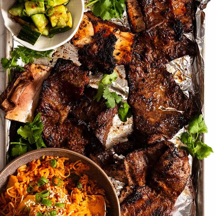 Overhead photo of tray with freshly cooked Korean BBQ Marinated Beef Short ribs (Galbi)