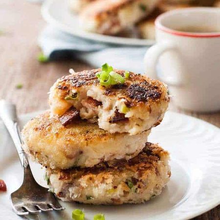 A stack of Mashed Potato Cakes with Cheese & Bacon