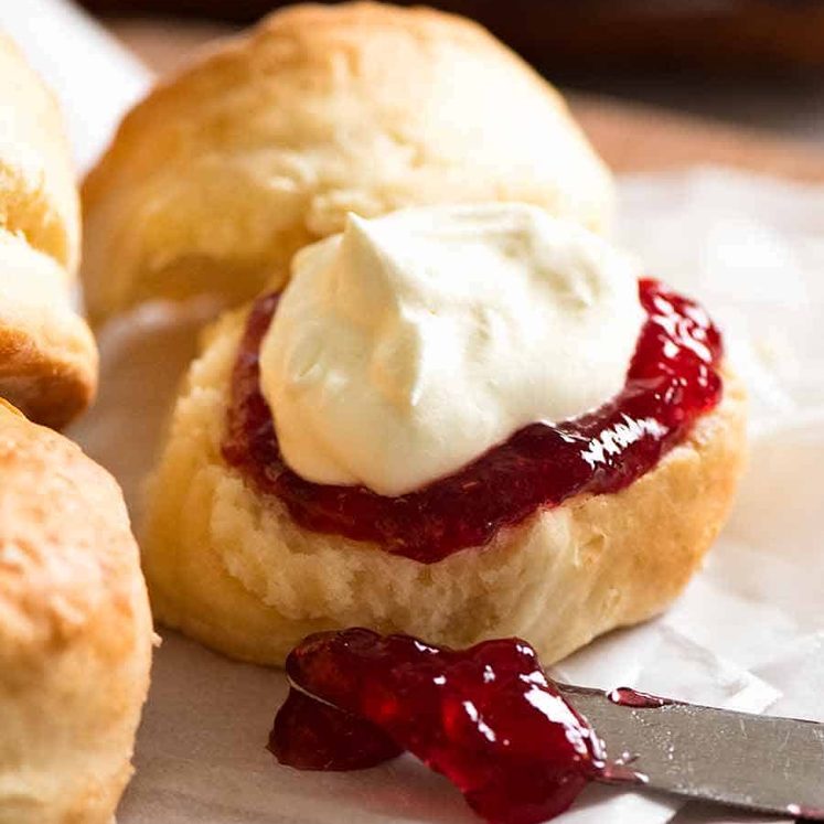 Close up of Lemonade Scones with jam and cream