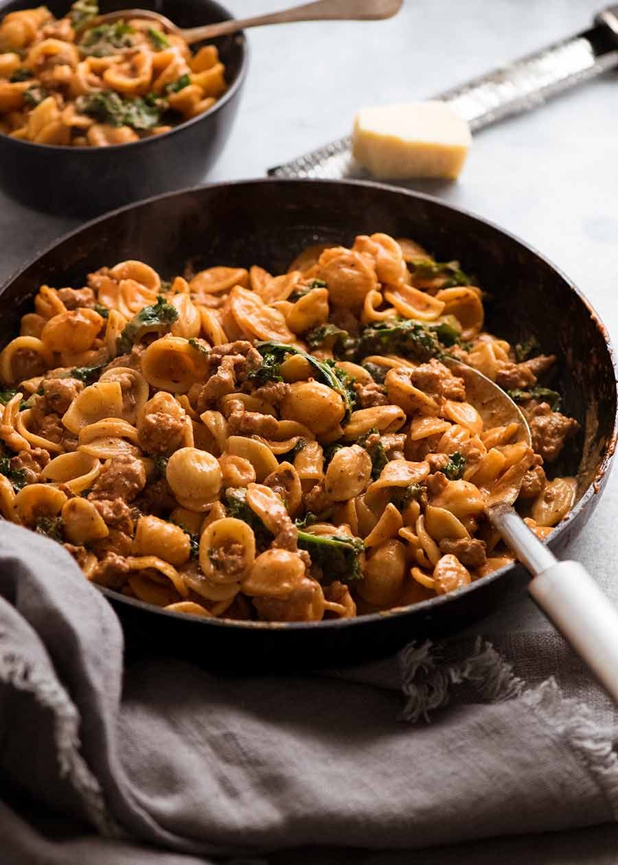 Orecchiette Sausage Pasta in Creamy Tomato Sauce in skillet, fresh off the stove