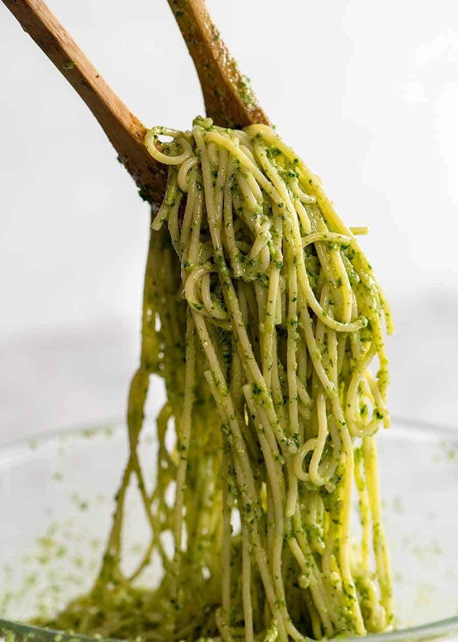 Tossing pesto pasta