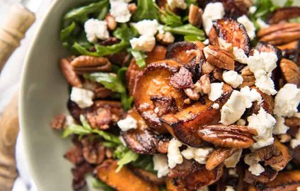 Roasted Sweet Potato Salad - with arugula/rocket, pecans, goats cheese or feta, a sprinkle of bacon and a beautiful Honey Lemon dressing. recipetineats.com