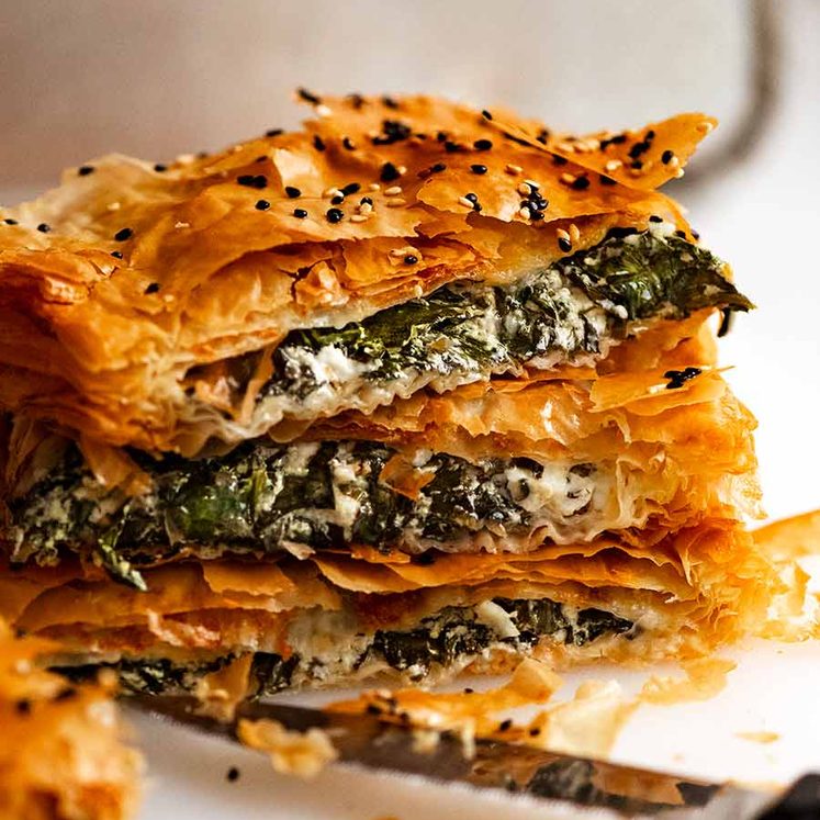 Stack of freshly baked Spanakopita slices