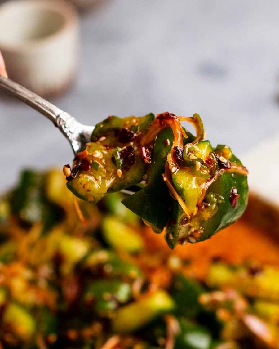 Close up photo of fork with Spicy Cucumber Salad