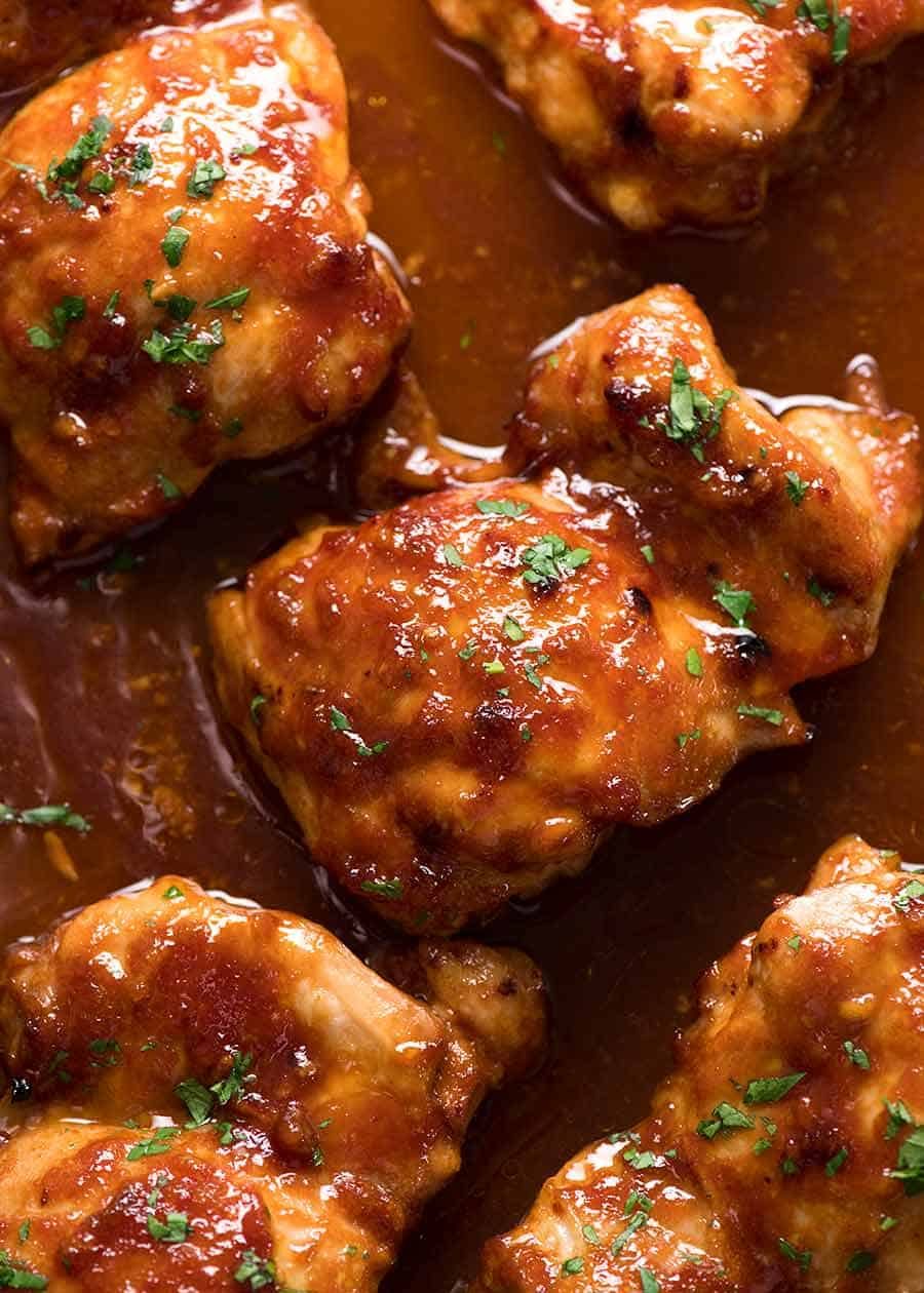 Overhead photo of Sticky Baked Chicken Thighs, fresh out of the oven