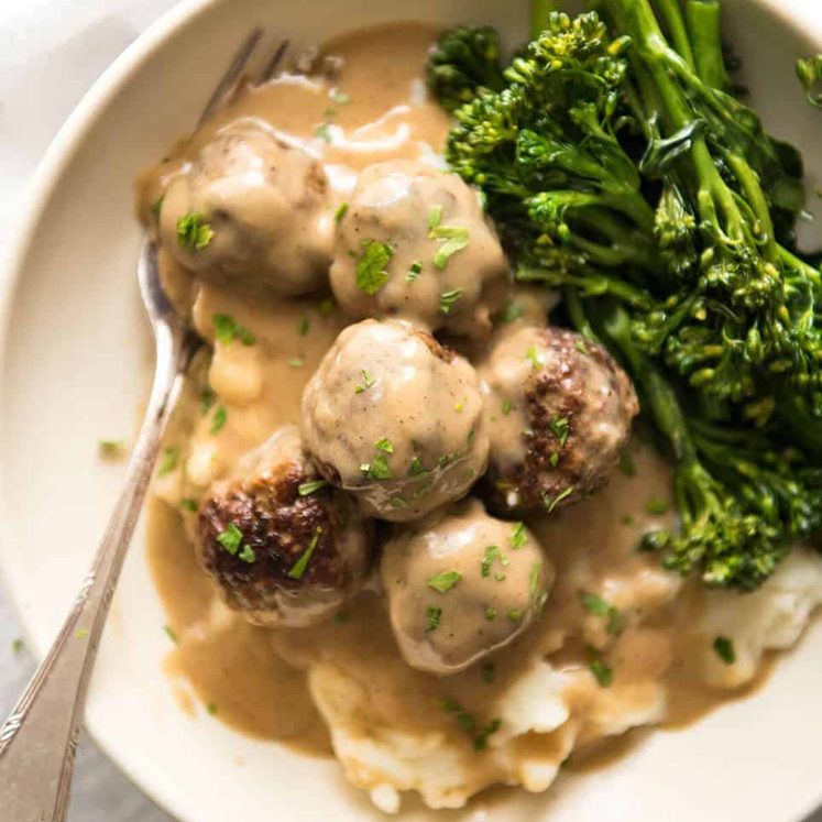 Swedish Meatballs - With a tip for extra soft and tasty meatballs, smothered in a gorgeous creamy sauce. No more Ikea meatballs! recipetineats.com