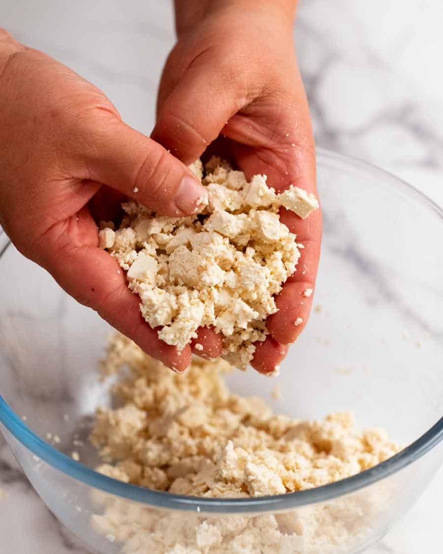 Crumbling firm tofu for Vegetarian lettuce wraps - san choy bow